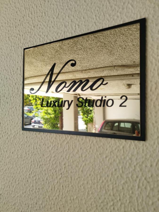 Nomo Studio Волос Екстериор снимка